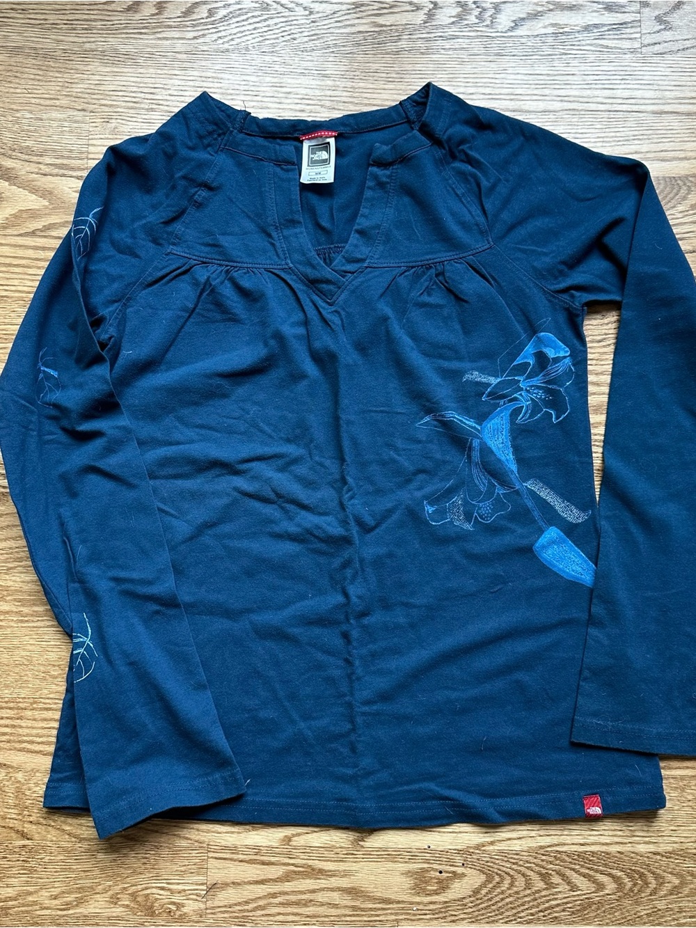 The North Face Ling Sleeved Top Size Medium. Never worn.